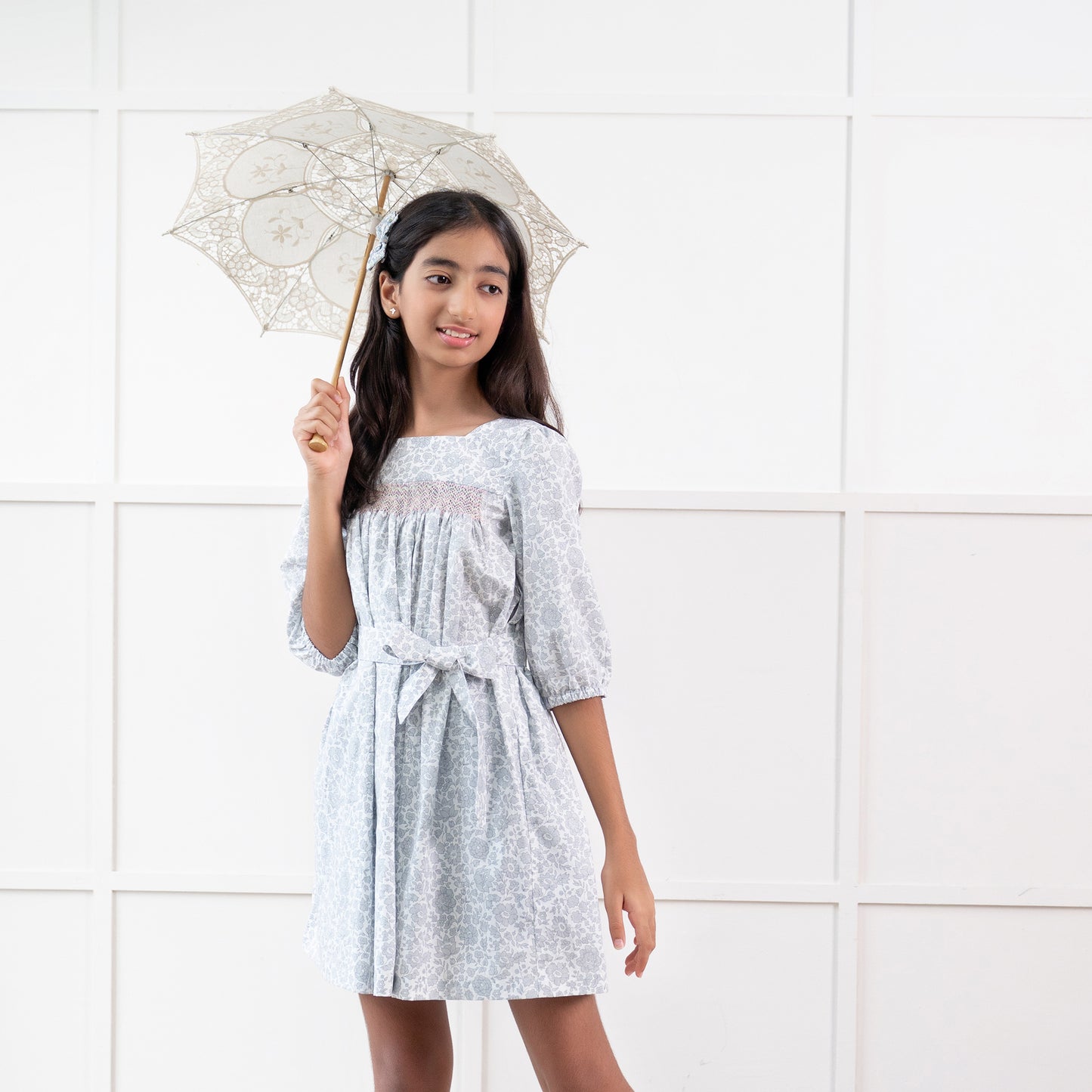 Florin – Hand Smocked Babydoll Dress in Grey
